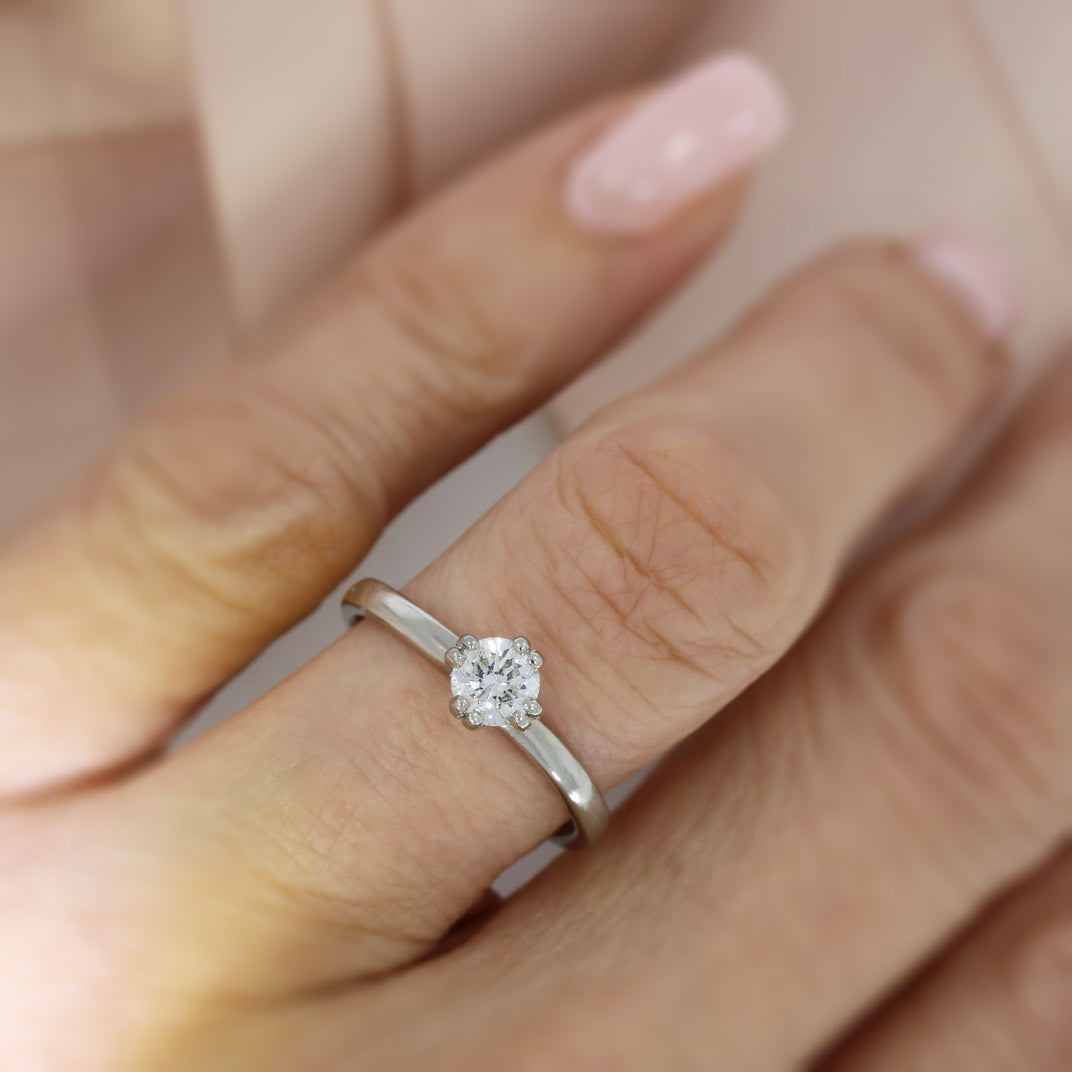 Pre Owned Palladium 950 4 double claw set diamond solitaire ring 0.50ct