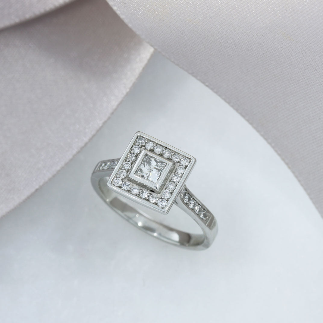 Pre Owned Platinum Princess Cut Diamond Halo Ring 0.58ct