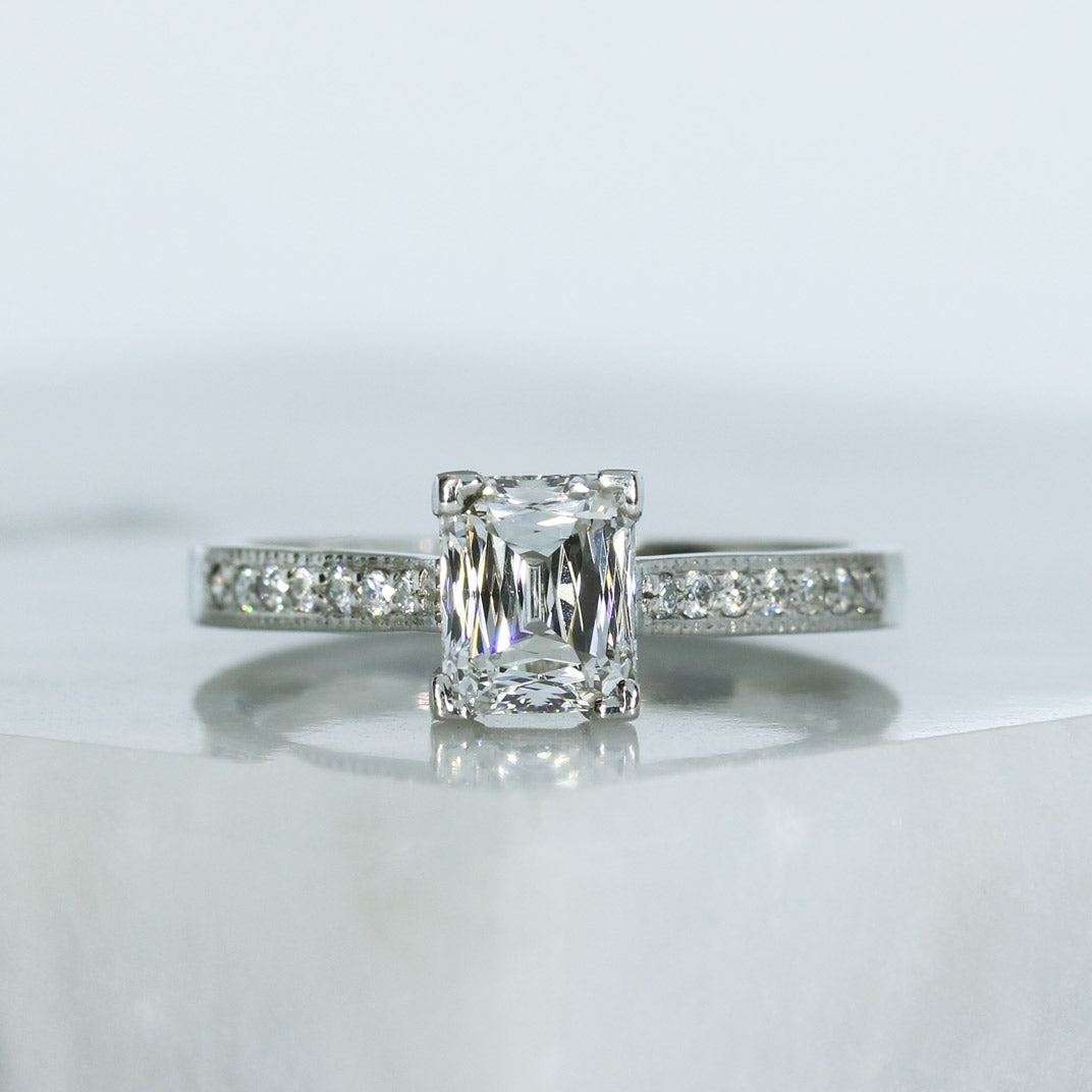 Pre Owned Certified Platinum Radiant Cut Oblong Diamond Solitaire Ring with Diamond Set Shoulders 1.32ct