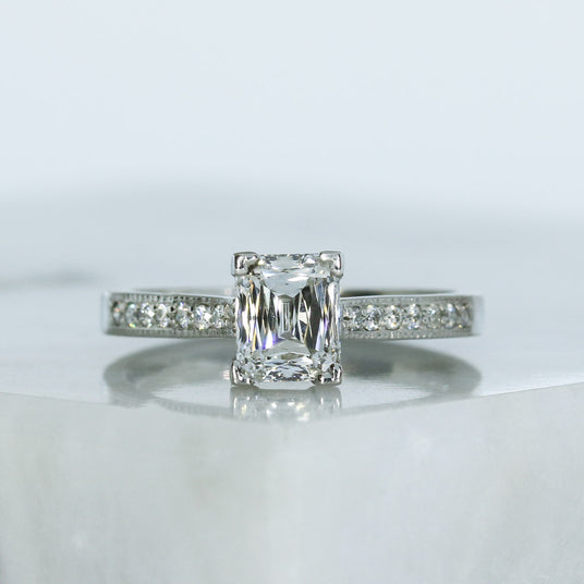 Pre Owned Certified Platinum Radiant Cut Oblong Diamond Solitaire Ring with Diamond Set Shoulders 1.32ct