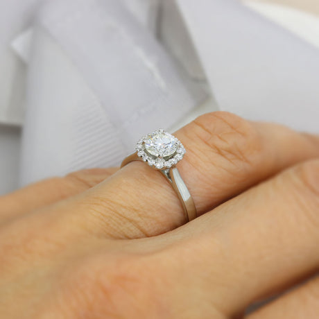 Pre Owned Certified Platinum Solitaire Diamond Ring with Halo Surround Total 1.13ct J VVS2