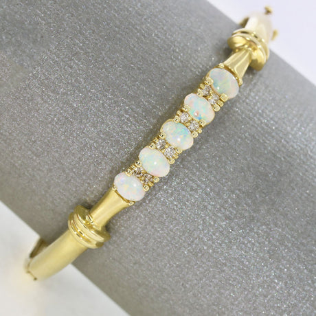 Pre Owned 14ct Yellow Gold Hinged Bangle Set with 5 Oval Opals