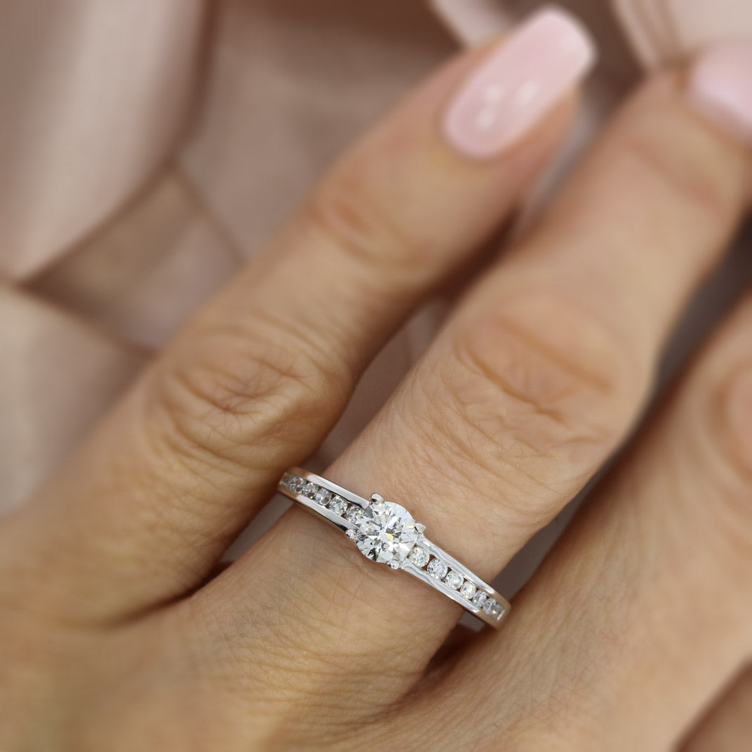 Pre Owned 18ct White Gold Diamond Solitaire Ring with Channel Diamond Shoulders 0.74ct