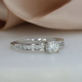 Pre Owned 18ct White Gold Diamond Solitaire Ring with Channel Diamond Shoulders 0.74ct