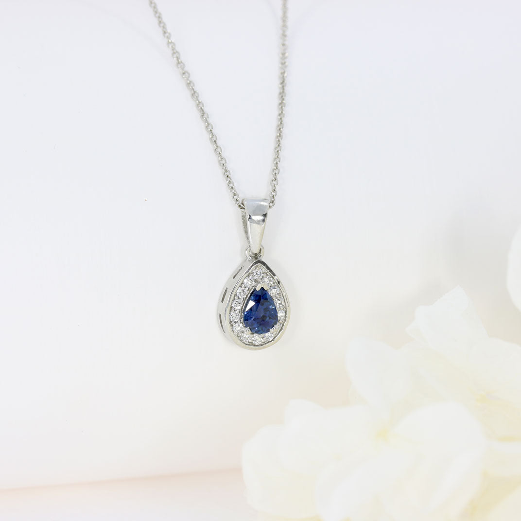 Platinum Pear Shape Sapphire & Diamond Halo Pendant On an 18 Inch Platinum Chain