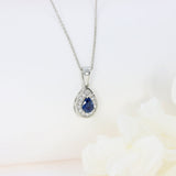 Platinum Pear Shape Sapphire & Diamond Halo Pendant On an 18 Inch Platinum Chain