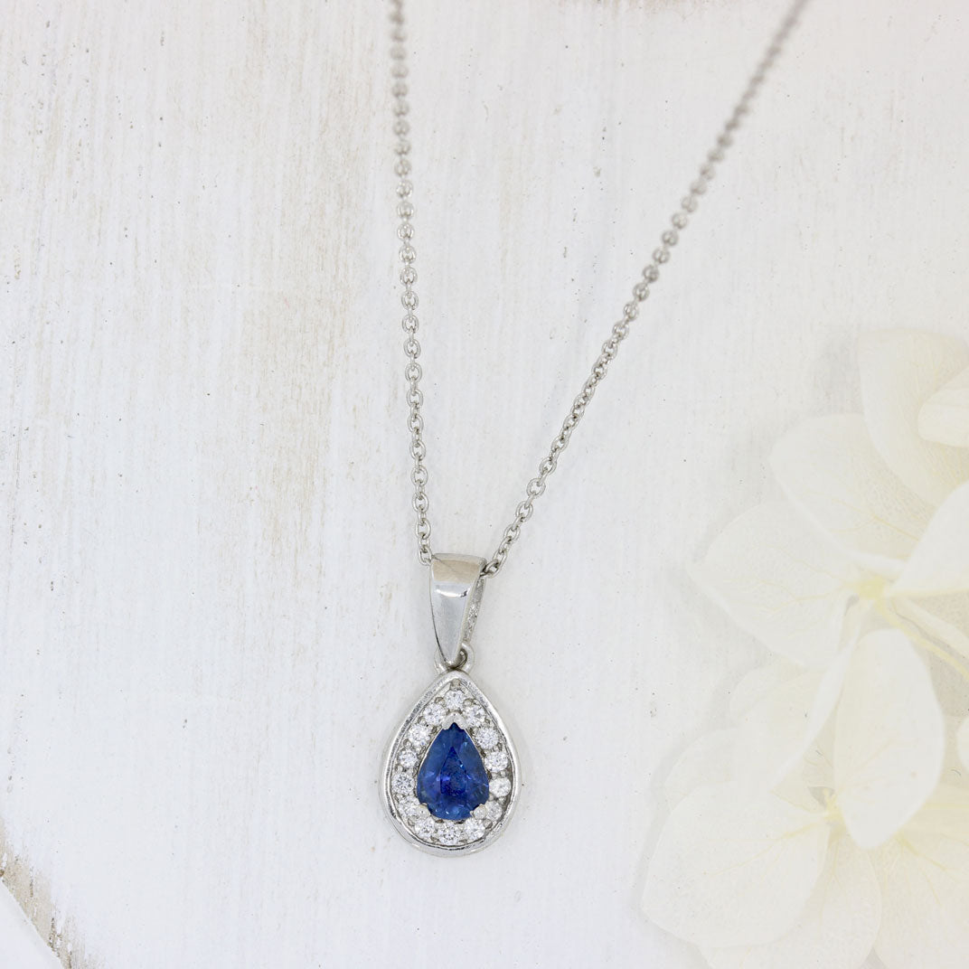 Platinum Pear Shape Sapphire & Diamond Halo Pendant On an 18 Inch Platinum Chain