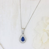 Platinum Pear Shape Sapphire & Diamond Halo Pendant On an 18 Inch Platinum Chain