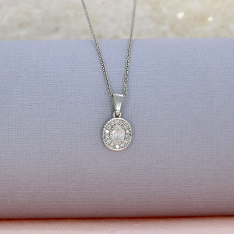 Platinum Oval Halo Diamond Pendant 0.50ct on Platinum Chain