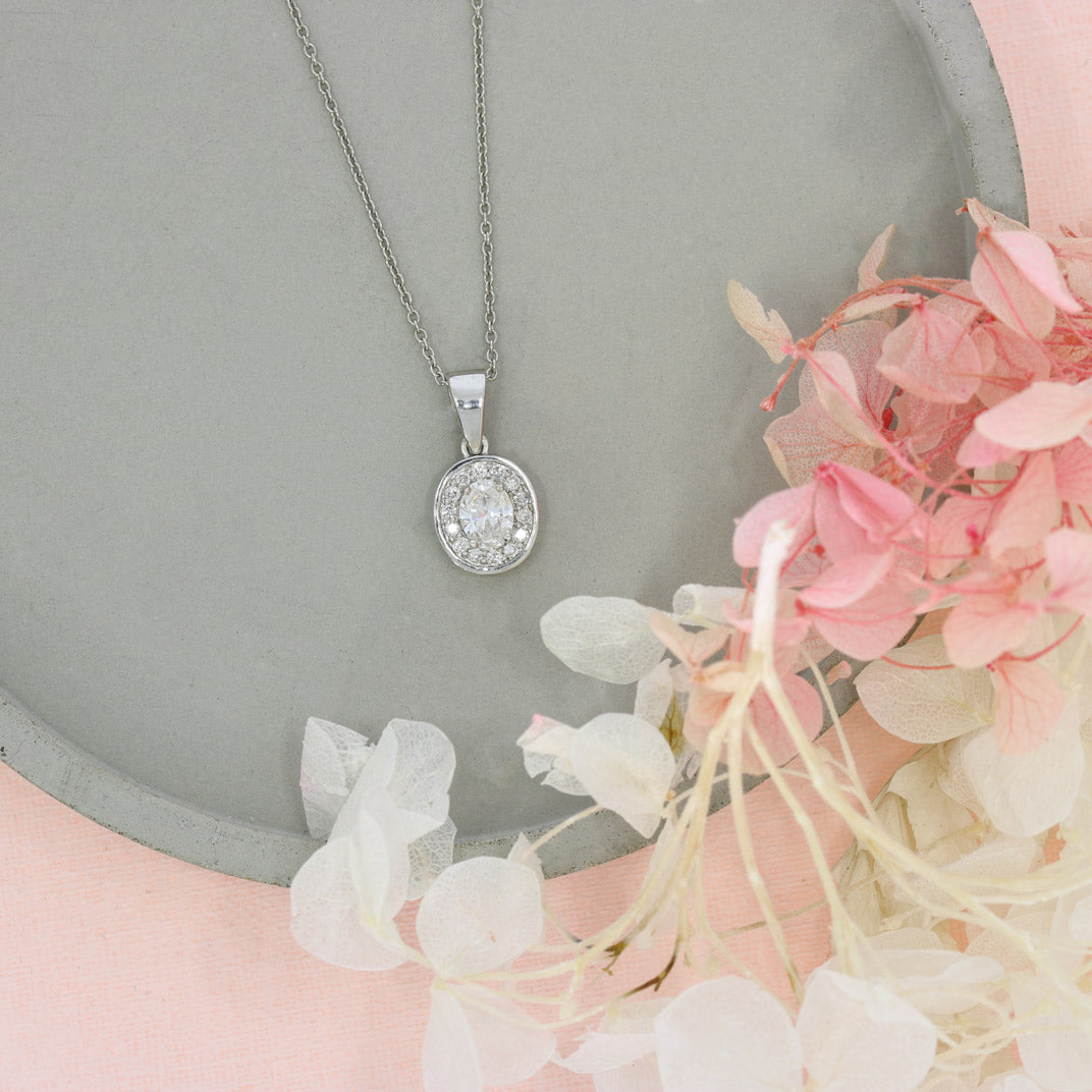 Platinum Oval Halo Diamond Pendant 0.50ct on Platinum Chain