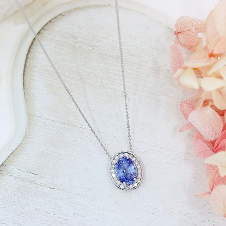 18ct White Gold Oval Claw Set Sapphire & Pave Diamond Halo Pendant on 18ct 18" Chain