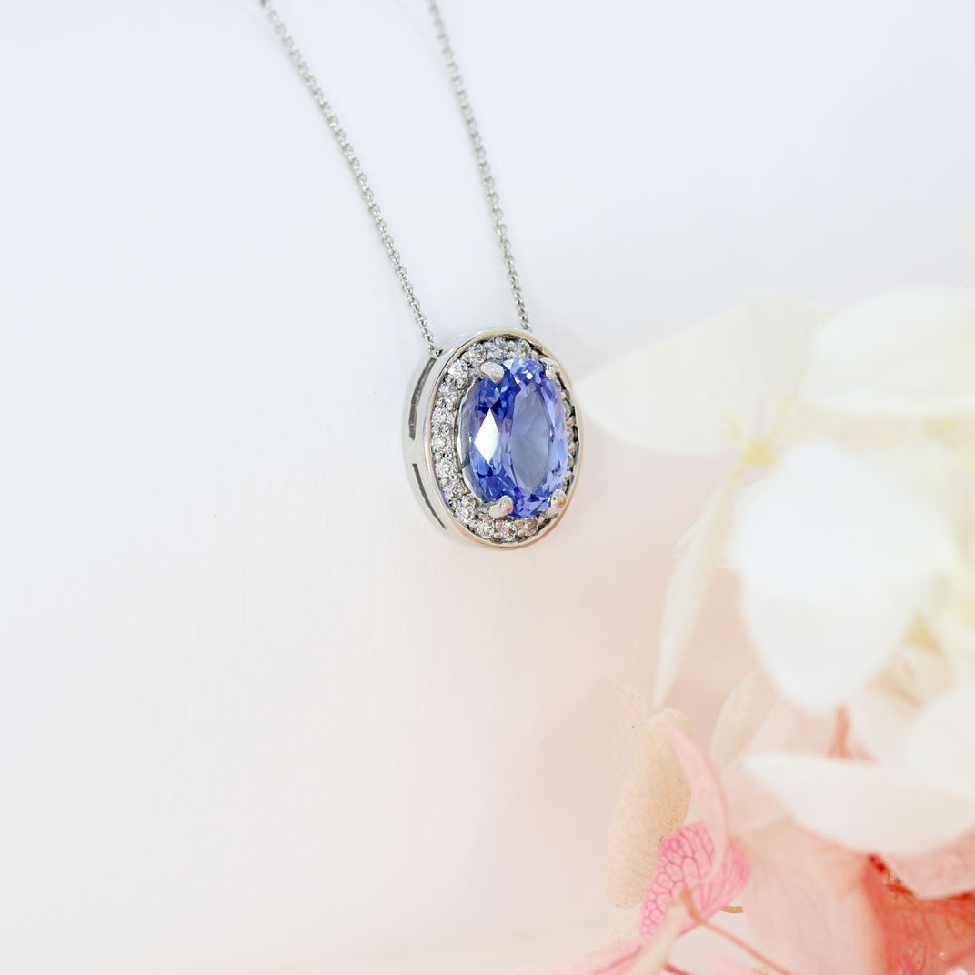 18ct White Gold Oval Claw Set Sapphire & Pave Diamond Halo Pendant on 18ct 18" Chain