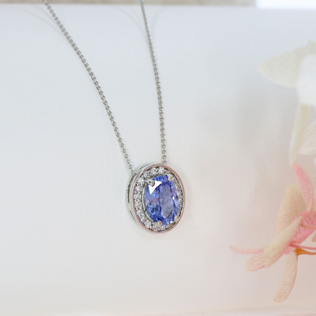 18ct White Gold Oval Claw Set Sapphire & Pave Diamond Halo Pendant on 18ct 18" Chain