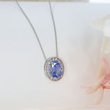 18ct White Gold Oval Claw Set Sapphire & Pave Diamond Halo Pendant on 18ct 18" Chain