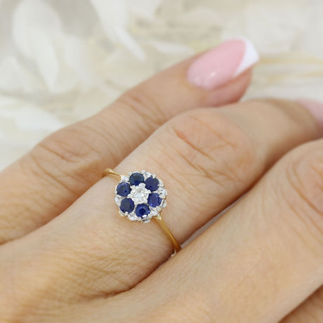 Pre Owned 18ct Yellow Gold Sapphire Cluster Ring with a Diamond Centre