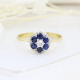 Pre Owned 18ct Yellow Gold Sapphire Cluster Ring with a Diamond Centre