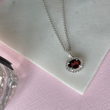Silver Oval Garnet & CZ Halo Earrings
