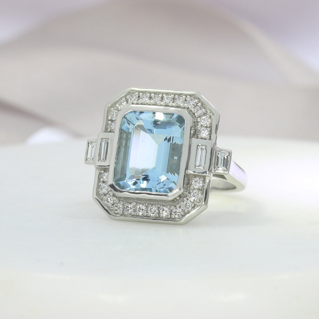 Aquamarine Dress Ring with Pave Set Diamond Halo Surround & Baguette Diamond Shoulders