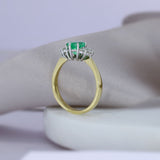 18ct Gold Oval Emerald Ring With Diamonds Either Side