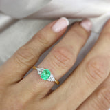 18ct Gold Oval Emerald Ring With Diamonds Either Side