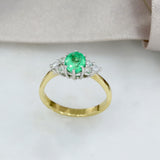 18ct Gold Oval Emerald Ring With Diamonds Either Side