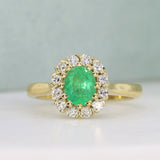 18ct Yellow Gold Oval Emerald & Round Diamond Cluster Ring