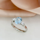 Platinum Oval Aquamarine & Pear Shaped Lab Grown Diamond 3 Stone Ring