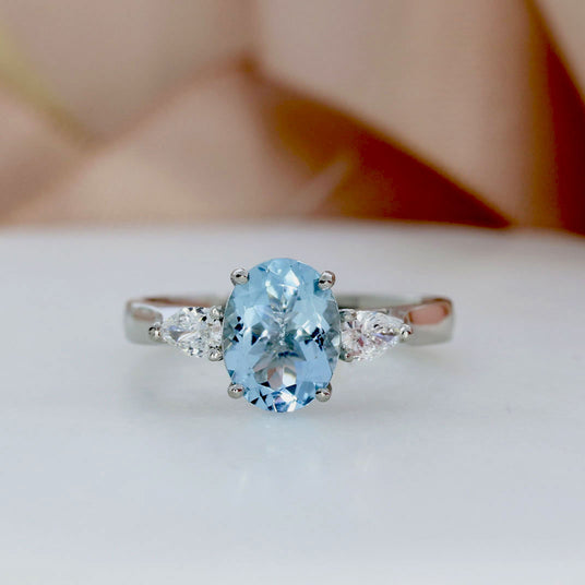 Platinum Oval Aquamarine & Pear Shaped Lab Grown Diamond 3 Stone Ring