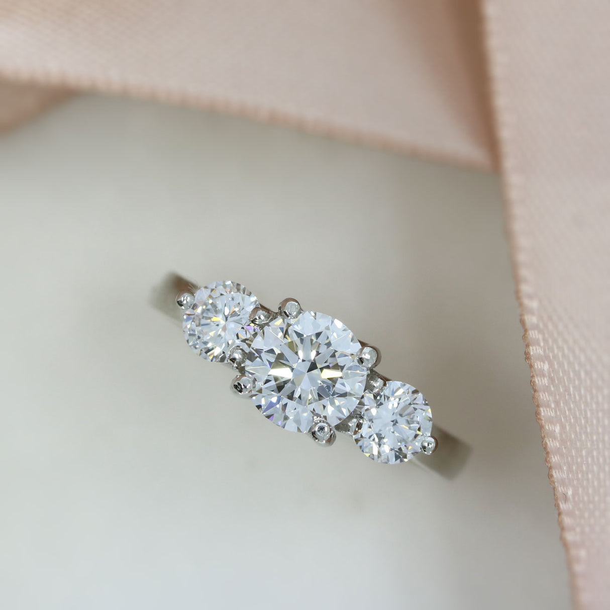 Platinum Claw Set Round Brilliant Cut Laboratory Grown Diamond 3 Stone Ring 1.71