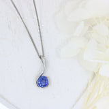 Platinum Rubover Set Round Sapphire Hook Shape Pendant on Platinum 18" Chain