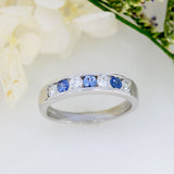 9ct White Gold Channel Set Sapphire & Lab Diamond Eternity Ring