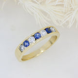 9ct Yellow Gold Channel Set Sapphire & Lab Diamond Eternity Ring