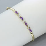 Pre Owned 9ct Gold Bangle with 4 Claw Set Oval Amethysts & Pave Set Diamond Detail