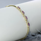 Pre Owned 9ct Gold Bangle with 4 Claw Set Oval Amethysts & Pave Set Diamond Detail