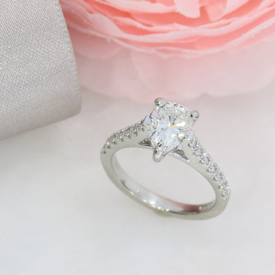 Platinum Diamond Solitaire Ring with Diamond Set Shoulders