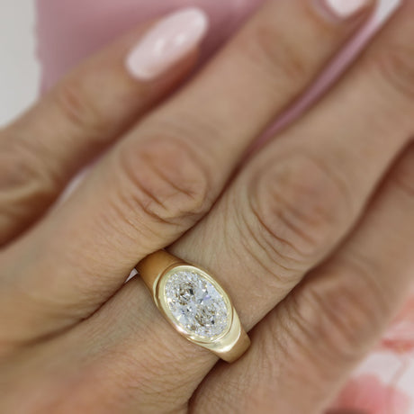 9ct Gold Certified Oval Lab Diamond Solitaire Ring in a Sideways Setting.