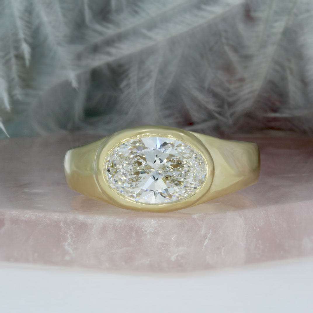 9ct Gold Certified Oval Lab Diamond Solitaire Ring in a Sideways Setting.