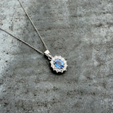 Platinum Sapphire & Diamond Cluster Pendant on a Platinum Chain