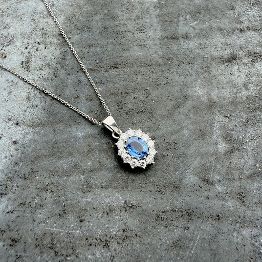 Platinum Sapphire & Diamond Cluster Pendant on a Platinum Chain