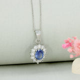Platinum Sapphire & Diamond Cluster Pendant on a Platinum Chain