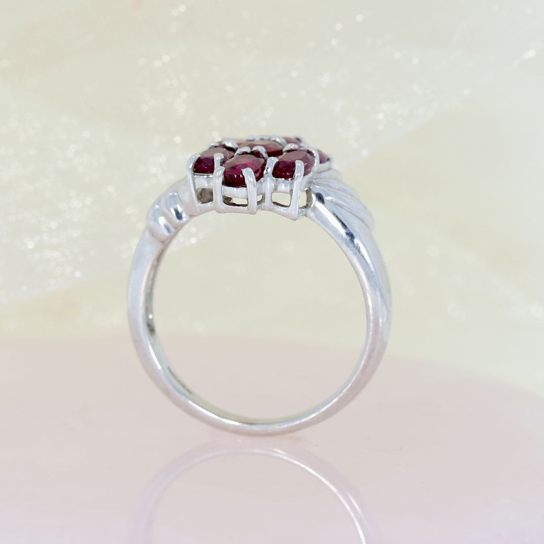 Pre Owned 9ct White Gold Oval Ruby Flower Cluster Ring