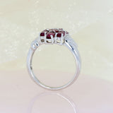 Pre Owned 9ct White Gold Oval Ruby Flower Cluster Ring