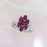 Pre Owned 9ct White Gold Oval Ruby Flower Cluster Ring