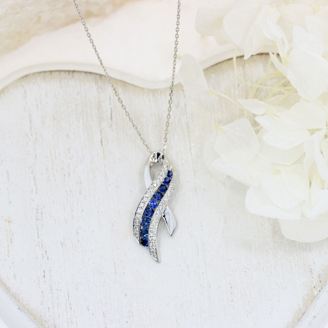 Pre Owned 18ct White Gold Sapphire & Diamond, Ribbon Style Pendant on a 16" chain