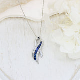Pre Owned 18ct White Gold Sapphire & Diamond, Ribbon Style Pendant on a 16" chain