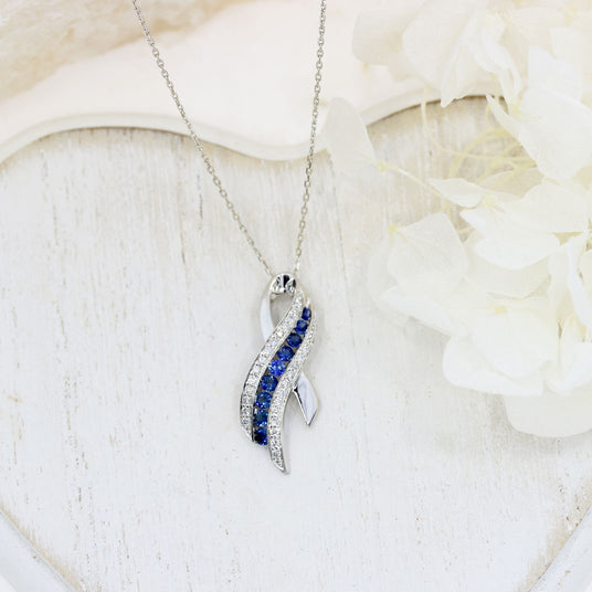 Pre Owned 18ct White Gold Sapphire & Diamond, Ribbon Style Pendant on a 16" chain