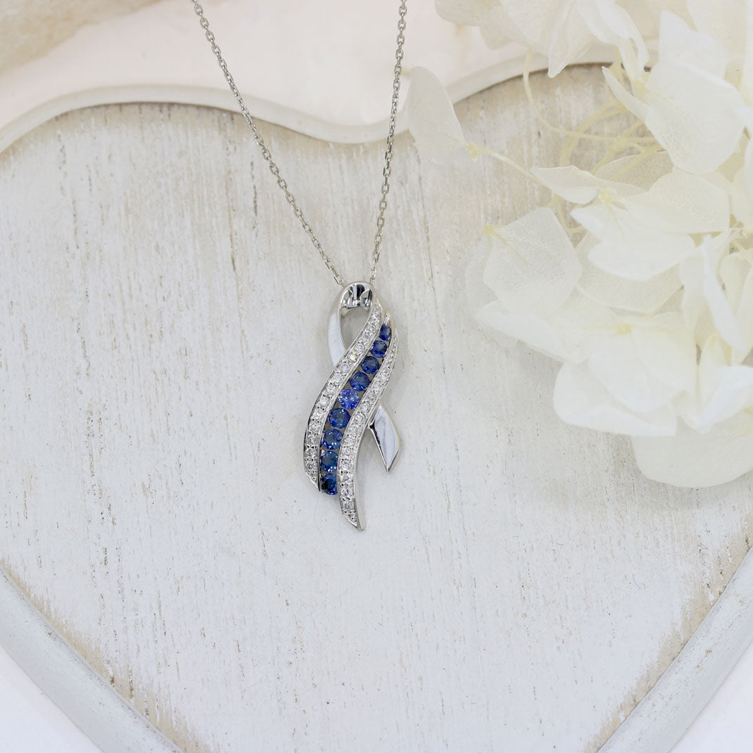 Pre Owned 18ct White Gold Sapphire & Diamond, Ribbon Style Pendant on a 16" chain