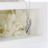 Pre Owned 18ct White Gold Sapphire & Diamond, Ribbon Style Pendant on a 16" chain
