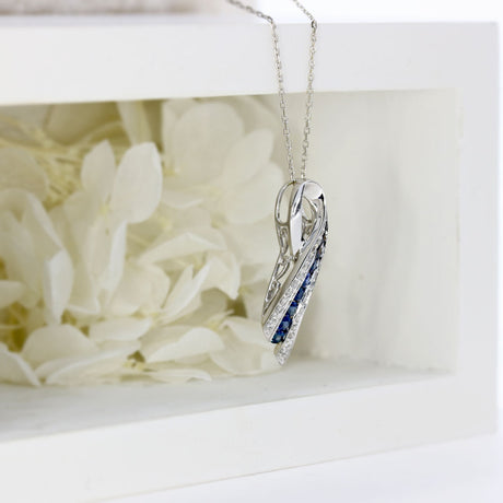 Pre Owned 18ct White Gold Sapphire & Diamond, Ribbon Style Pendant on a 16" chain