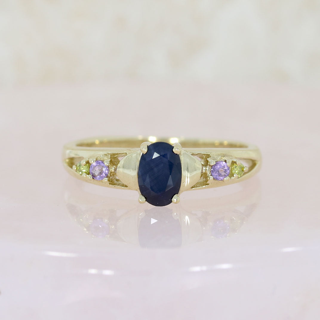 Pre Owned 9ct Yellow Gold Oval Sapphire Ring with Amethyst & Peridot Shoulders